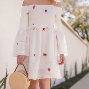 Elegant Off-Shoulder White Dress with Red Floral Accents